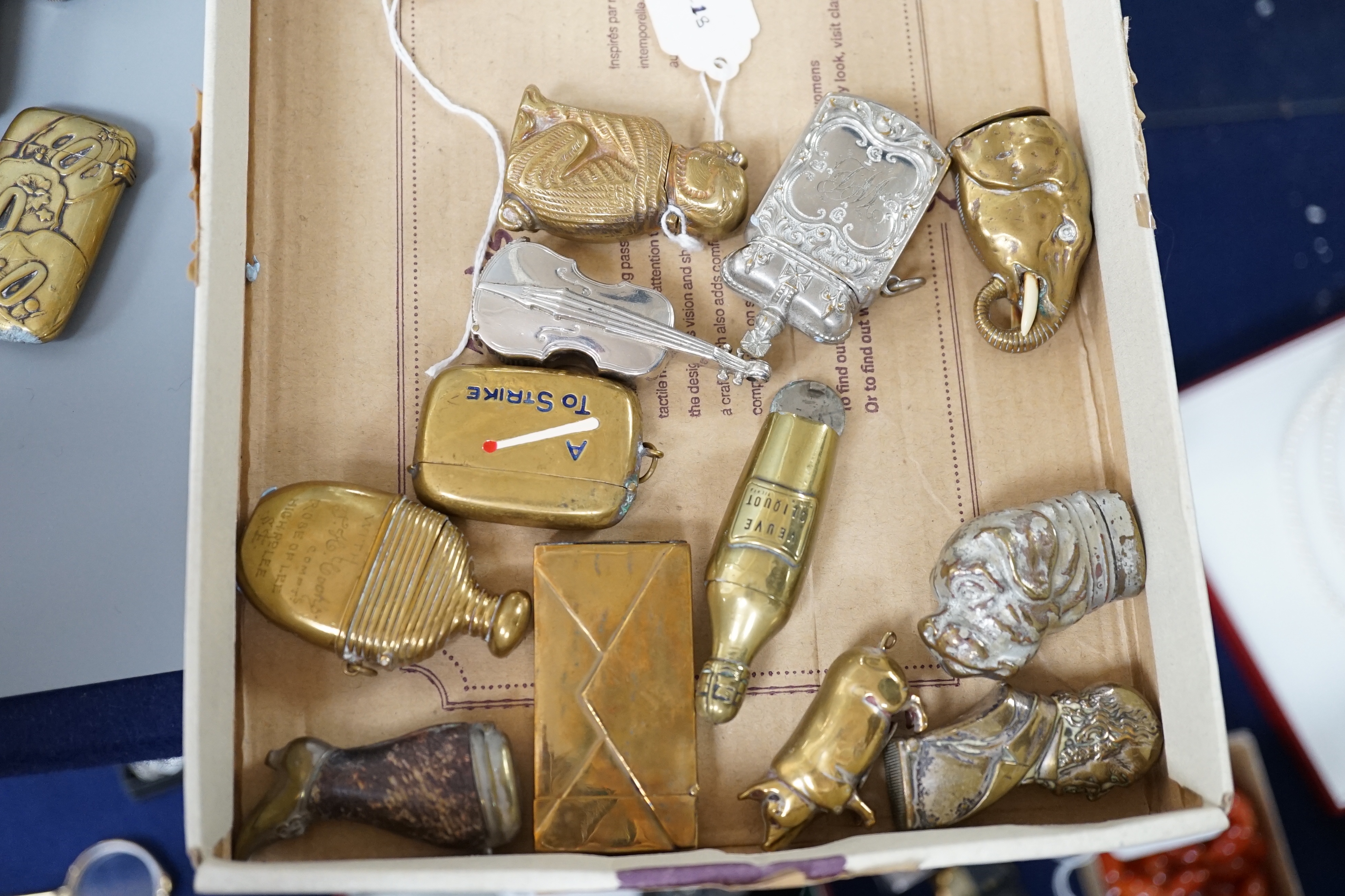 A collection of mostly 20th century novelty vestas
